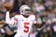 INDIANAPOLIS, IN - DECEMBER 07: Quarterback Braxton Miller #5 of the Ohio State Buckeyes delivers a pass during the Big Ten Conference Championship game against the Michigan State Spartans at Lucas Oil Stadium on December 7, 2013 in Indianapolis, Indiana