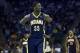 Nov 27, 2013; Charlotte, NC, USA; Indiana Pacers center Roy Hibbert (55) reacts during the second quarter against the Charlotte Bobcats at Time Warner Cable Arena. Mandatory Credit: Joshua S. Kelly-USA TODAY Sports
