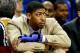 Dec 4, 2013; New Orleans, LA, USA; New Orleans Pelicans power forward Anthony Davis out with a hand fracture watches from the bench during the second half of a game against the Dallas Mavericks at New Orleans Arena.The Mavericks defeated the Pelicans 100-
