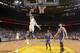 OAKLAND, CA - NOVEMBER 20: Andre Iguodala #9 of the Golden State Warriors goes up for a dunk against the Memphis Grizzlies on November 20, 2013 at Oracle Arena in Oakland, California. NOTE TO USER: User expressly acknowledges and agrees that, by downloadi