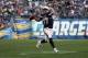 SAN DIEGO, CA - DECEMBER 08: Quarterback Philip Rivers #17 of the San Diego Chargers looks for an open receiver against the New York Giants in the second half at Qualcomm Stadium on December 8, 2013 in San Diego, California. The Chargers defeated the Gia