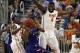 Dec 10, 2013; Gainesville, FL, USA; Florida Gators guard Michael Frazier II (20) and center Patric Young (4) defend against Kansas Jayhawks guard Wayne Selden, Jr. (1) during the first half at Stephen C. O'Connell Center. Mandatory Credit: Kim Klement-USA