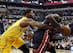 Dec 10, 2013; Indianapolis, IN, USA; Miami Heat forward LeBron James (6) has the ball knocked away by Indiana Pacers forward Paul George (24) at Bankers Life Fieldhouse. Mandatory Credit: Brian Spurlock-USA TODAY Sports