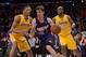 Dec 10, 2013; Los Angeles, CA, USA; Phoenix Suns guard Goran Dragic (1) is defended by Los Angeles Lakers guard Wesley Johnson (11) and forward Jodie Meeks (20) at Staples Center. Mandatory Credit: Kirby Lee-USA TODAY Sports