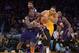 Dec 10, 2013; Los Angeles, CA, USA; Phoenix Suns guard Eric Bledsoe (2) and Los Angeles Lakers forward Xavier Henry (7) battle for the ball at Staples Center. The Suns defeated the Lakers 114-108. Mandatory Credit: Kirby Lee-USA TODAY Sports