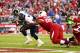 Dec 8, 2013; Phoenix, AZ, USA; St. Louis Rams running back Zac Stacy (30) scores a touchdown in the fourth quarter under pressure from Arizona Cardinals defensive tackle Dan Williams at University of Phoenix Stadium. The Cardinals defeated the Rams 30-10.