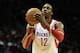 HOUSTON, TX - DECEMBER 08: Dwight Howard #12 of the Houston Rockets take a free throw during the game against the Orlando Magic at Toyota Center on December 8, 2013 in Houston, Texas. NOTE TO USER: User expressly acknowledges and agrees that, by download