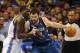 Dec 1, 2013; Oklahoma City, OK, USA; Minnesota Timberwolves power forward Kevin Love (42) handles the ball against Oklahoma City Thunder center Kendrick Perkins (5) during the fourth quarter at Chesapeake Energy Arena. Mandatory Credit: Mark D. Smith-USA