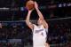 LOS ANGELES, CA - NOVEMBER 16: J.J. Redick #4 of the Los Angeles Clippers attempts a shot during a game against the Brooklyn Nets on November 16, 2013 at STAPLES Center in Los Angeles, California. NOTE TO USER: User expressly acknowledges and agrees that,