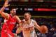 PHOENIX, AZ - OCTOBER 15: Miles Plumlee #22 of the Phoenix Suns drives against Byron Mullens #0 of the Los Angeles Clipper on October 15, 2013 at U.S. Airways Center in Phoenix, Arizona. NOTE TO USER: User expressly acknowledges and agrees that, by downlo