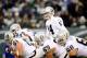 EAST RUTHERFORD, NJ - DECEMBER 08: Matt McGloin #14 of the Oakland Raiders calls a play during the second half against the New York Jets at MetLife Stadium on December 8, 2013 in East Rutherford, New Jersey. The Jets defeat the Raiders 37-27. (Photo by M