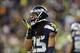 Dec 2, 2013; Seattle, WA, USA; Seattle Seahawks cornerback Richard Sherman (25) pretends to yawn while looking at the New Orleans Saints sideline during the second half at CenturyLink Field. Seattle defeated New Orleans 34-7. Mandatory Credit: Steven Bisi