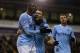 WEST BROMWICH, ENGLAND - DECEMBER 04: Yaya Toure (L) of Manchester City celebrates with team mate James Milner after scoring his second goal during the Premier League match between West Bromwich Albion and Manchester City at The Hawthorns on December 4,