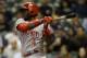 MILWAUKEE, WI - SEPTEMBER 13: Brandon Phillips #4 of the Cincinnati Reds singles in the top of the first inning against the Milwaukee Brewers at Miller Park on September 13, 2013 in Milwaukee, Wisconsin. (Photo by Mike McGinnis/Getty Images)