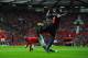 MANCHESTER, ENGLAND - SEPTEMBER 14: Ashley Young of Manchester United goes to ground after a challenge from Kagisho Dikgacoi of palace befoe being booked for divingduring the Barclays Premier League match between Manchester United and Crystal Palace at Ol
