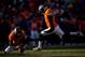 DENVER, CO - DECEMBER 8: Place kicker Matt Prater #5 of the Denver Broncos makes a 25-yard field goal on a hold by Britton Colquitt #4 during the first quarter against the Tennessee Titans at Sports Authority Field Field at Mile High on December 8, 2013