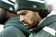 EAST RUTHERFORD, NJ - DECEMBER 1: Mark Sanchez #6 of the New York Jets walk on the sidelines against the Miami Dolphins during their game at MetLife Stadium on December 1, 2013 in East Rutherford, New Jersey. (Photo by Jeff Zelevansky/Getty Images)