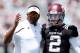 COLLEGE STATION, TX - APRIL 13: Head coach Kevin Sumlin of the Texas A&M Aggies chats with his quarterback Johnny Manziel #2 before the Maroon & White spring football game at Kyle Field on April 13, 2013 in College Station, Texas. (Photo by Scott Haller
