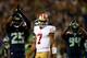 SEATTLE, WA - SEPTEMBER 15: Colin Kaepernick #7 of the San Francisco 49ers looks on as Richard Sherman #25 and D'Anthony Smith #94 of the Seattle Seahawks celebrate a saftey during their game at Qwest Field on September 15, 2013 in Seattle, Washington.