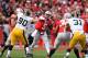COLUMBUS, OH - OCTOBER 19: Quarterback Braxton Miller #5 of the Ohio State Buckeyes passes downfield in the second quarter against the Iowa Hawkeyes at Ohio Stadium on October 19, 2013 in Columbus, Ohio. (Photo by Jamie Sabau/Getty Images)