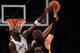 NEW YORK, NY - NOVEMBER 27: Kevin Garnett #2 of the Brooklyn Nets blocks a shot by Pau Gasol #16 of the Los Angeles Lakers during the second half at Barclays Center on November 27, 2013 in the Brooklyn borough of New York City. The Lakers defeat the Nets