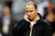 DETROIT, MI - OCTOBER 17: New York Yankees general manager Brian Cashman talks on the phone on the field during batting practice against the Detroit Tigers during game four of the American League Championship Series at Comerica Park on October 17, 2012 i