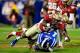 CHARLOTTE, NC - DECEMBER 07: Defensive back Terrence Brooks #31 of the Florida State Seminoles tackles wide receiver Issac Blakeney #17 of the Duke Blue Devils during the ACC Championship game at Bank of America Stadium on December 7, 2013 in Charlotte,
