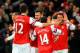 LONDON, ENGLAND - DECEMBER 08: Mesut Oezil of Arsenal celebrates scoring their first goal with team mates during the Barclays Premier League match between Arsenal and Everton at Emirates Stadium on December 8, 2013 in London, England. (Photo by Michael