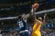 OKLAHOMA CITY, OK - DECEMBER 13: Jodie Meeks #20 of the Los Angeles Lakers drives to the basket against the Oklahoma City Thunder on December 13, 2013 at the Chesapeake Energy Arena in Oklahoma City, Oklahoma. NOTE TO USER: User expressly acknowledges an