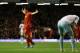 LIVERPOOL, ENGLAND - DECEMBER 07: Luis Suarez of Liverpool celebrates afterJoey O'Brien of West Ham United scored an own goal during the Barclays Premier League match between Liverpool and West Ham United at Anfield on December 7, 2013 in Liverpool, Engl