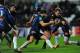 SWANSEA, WALES - DECEMBER 13: Ospreys player Ben John is tackled by Remi Lamerat during the Heineken Cup pool 1 round 4 match between Ospreys and Castres Olympique at Liberty Stadium on December 13, 2013 in Swansea, Wales. (Photo by Stu Forster/Getty Im