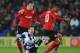 CARDIFF, WALES - DECEMBER 14: Jordon Mutch (L) and Frazier Campbell (R) of Cardiff City together with Morgan Amalfitano of West Bromwich Albion battle for the ball during the Barclays Premier League match between Cardiff City and West Bromwich Albion at C