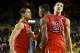 Dec 14, 2013; Ann Arbor, MI, USA; Arizona Wildcats guard Nick Johnson (13) forward Rondae Hollis-Jefferson (23) and forward Aaron Gordon (11) celebrate in the second half against the Michigan Wolverines at Crisler Center. Arizona won 72-70. Mandatory Cred