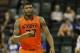 Dec 1, 2013; Lake Buena Vista, FL, USA; Oklahoma State Cowboys guard Marcus Smart (33) points against the Memphis Tigers during the first half at ESPN Wide World of Sports. Mandatory Credit: Kim Klement-USA TODAY Sports