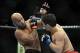 December 14, 2013; Sacramento, CA, USA; Demetrious Johnson (red gloves) fights Joseph Benavidez (blue gloves) during the flyweight championship bout of the UFC on FOX 9 at Sleep Train Arena. Mandatory Credit: Kyle Terada-USA TODAY Sports