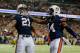 ATLANTA, GA - DECEMBER 07: Tre Mason #21 of the Auburn Tigers celebrates his fourth quarter touchdown with teammate quarterback Nick Marshall #14 against the Missouri Tigers during the SEC Championship Game at Georgia Dome on December 7, 2013 in Atlanta,