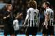 NEWCASTLE UPON TYNE, ENGLAND - DECEMBER 14: Referee Mike Jones speaks with Fabrizio Coloccini and Michael Williamson of Newcastle United during the Barclays Premier League match between Newcastle United and Southampton at St James' Park on December 14, 2