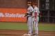 September 6, 2013; San Francisco, CA, USA; Arizona Diamondbacks third baseman Eric Chavez (12, left) is congratulated by first base coach Steve Sax (5, right) after getting the Diamondbacks' first hit of the game during the ninth inning against the San Fr