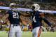ATLANTA, GA - DECEMBER 07: Tre Mason #21 of the Auburn Tigers celebrates his fourth quarter touchdown with teammate quarterback Nick Marshall #14 against the Missouri Tigers during the SEC Championship Game at Georgia Dome on December 7, 2013 in Atlanta,