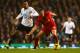 LONDON, ENGLAND - DECEMBER 15: Jordan Henderson of Liverpool is marked by Mousa Dembele of Tottenham Hotspur during the Barclays Premier League match between Tottenham Hotspur and Liverpool at White Hart Lane on December 15, 2013 in London, England. (Pho