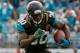 JACKSONVILLE, FL - DECEMBER 15: Jordan Todman #30 of the Jacksonville Jaguars runs for yardage during the game against the Buffalo Bills at EverBank Field on December 15, 2013 in Jacksonville, Florida. (Photo by Sam Greenwood/Getty Images)