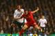 LONDON, ENGLAND - DECEMBER 15: Jordan Henderson of Liverpool is marked by Mousa Dembele of Tottenham Hotspur during the Barclays Premier League match between Tottenham Hotspur and Liverpool at White Hart Lane on December 15, 2013 in London, England. (Ph