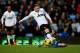 BIRMINGHAM, ENGLAND - DECEMBER 15: Wayne Rooney of Manchester United is tackled by Matthew Lowton of Aston Villa during the Barclays Premier League match between Aston Villa and Manchester United at Villa Park on December 15, 2013 in Birmingham, England.