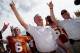 DALLAS, TX - OCTOBER 12: Case McCoy #6 of the Texas Longhorns and head coach Mack Brown of the Texas Longhorns celebrate after the Longhorns beat the Oklahoma Sooners 36-20 at the Cotton Bowl on October 12, 2013 in Dallas, Texas. (Photo by Tom Penningto