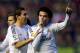 PAMPLONA, SPAIN - DECEMBER 14: Pepe (R) of Real Madrid CF celebrates scoring their second goal with team-mate Angel Di Maria during the La Liga match between CA Osasuna and Real Madrid CF at Estadio El Sadar de Navarra on December 14, 2013 in Pamplona, Sp