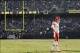 Dec 15, 2013; Oakland, CA, USA; Kansas City Chiefs quarterback Alex Smith (11) stands on the field during a break in the action against the Oakland Raiders in the second quarter at O.co Coliseum. The Chiefs defeated the Raiders 56-31. Mandatory Credit: Ca