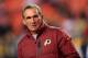 LANDOVER, MD - NOVEMBER 25: Head coach Mike Shanahan of the Washington Redskins watches his team warm up before the start of their game against the San Francisco 49ers at FedExField on November 25, 2013 in Landover, Maryland. (Photo by Rob Carr/Getty Ima