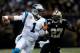 NEW ORLEANS, LA - DECEMBER 08: Cam Newton #1 of the Carolina Panthers is tackled by Malcolm Jenkins #27 of the New Orleans Saints at Mercedes-Benz Superdome on December 8, 2013 in New Orleans, Louisiana. (Photo by Chris Graythen/Getty Images)