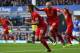 LIVERPOOL, ENGLAND - NOVEMBER 23: Coutinho of Liverpool celebrates scoring the opening goal during the Barclays Premier League match between Everton and Liverpool at Goodison Park on November 23, 2013 in Liverpool, England. (Photo by Alex Livesey/Getty