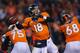 DENVER, CO - DECEMBER 12: Peyton Manning #18 of the Denver Broncos looks to pass against the San Diego Chargers in the second quarter at Sports Authority Field at Mile High on December 12, 2013 in Denver, Colorado. (Photo by Justin Edmonds/Getty Images)